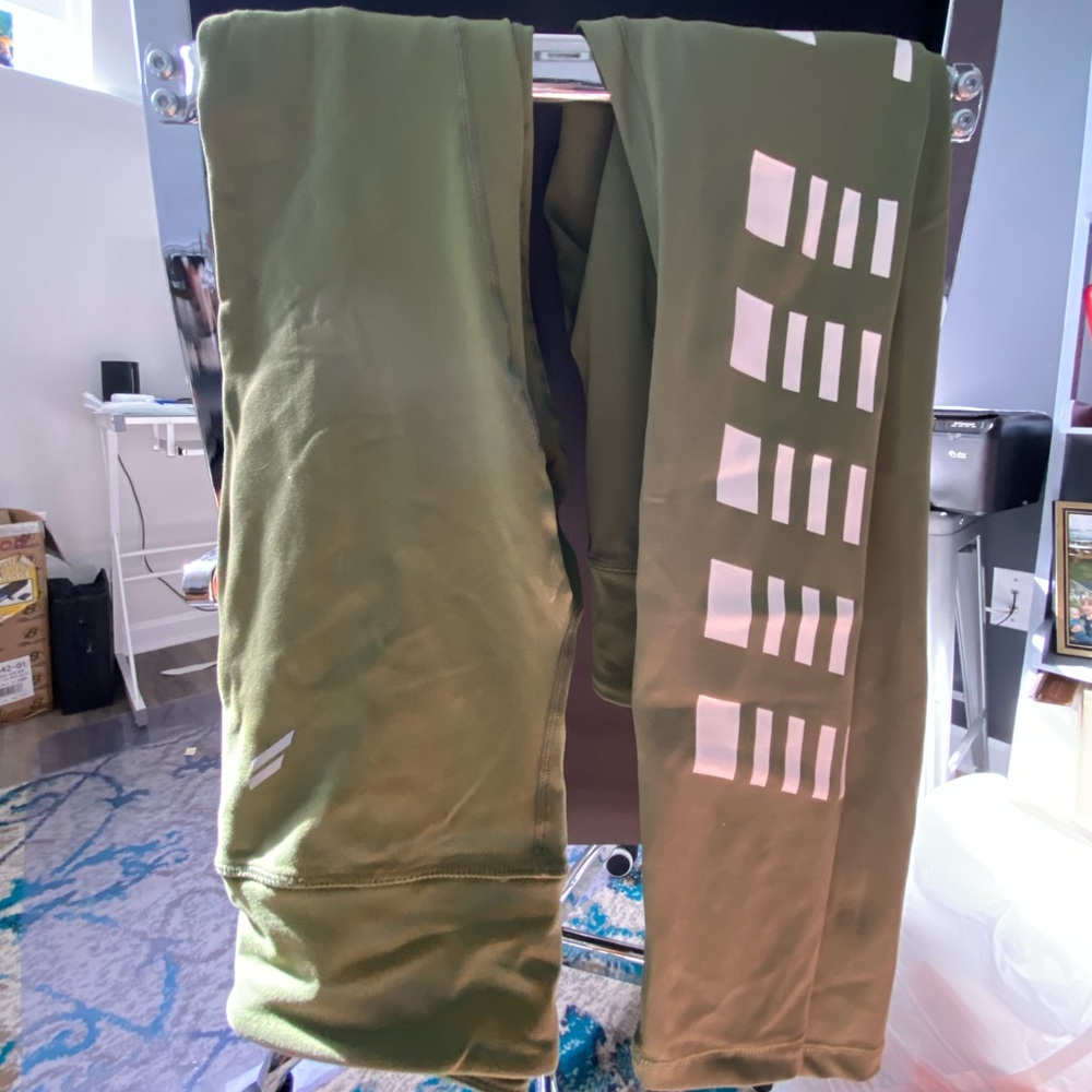 Two pairs of DYE leggings- one MESH the other LOGO